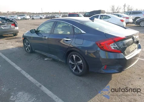 2018 Honda Civic Touring z USA, uszkodzony, nr VIN JHMFC1F94JX030428